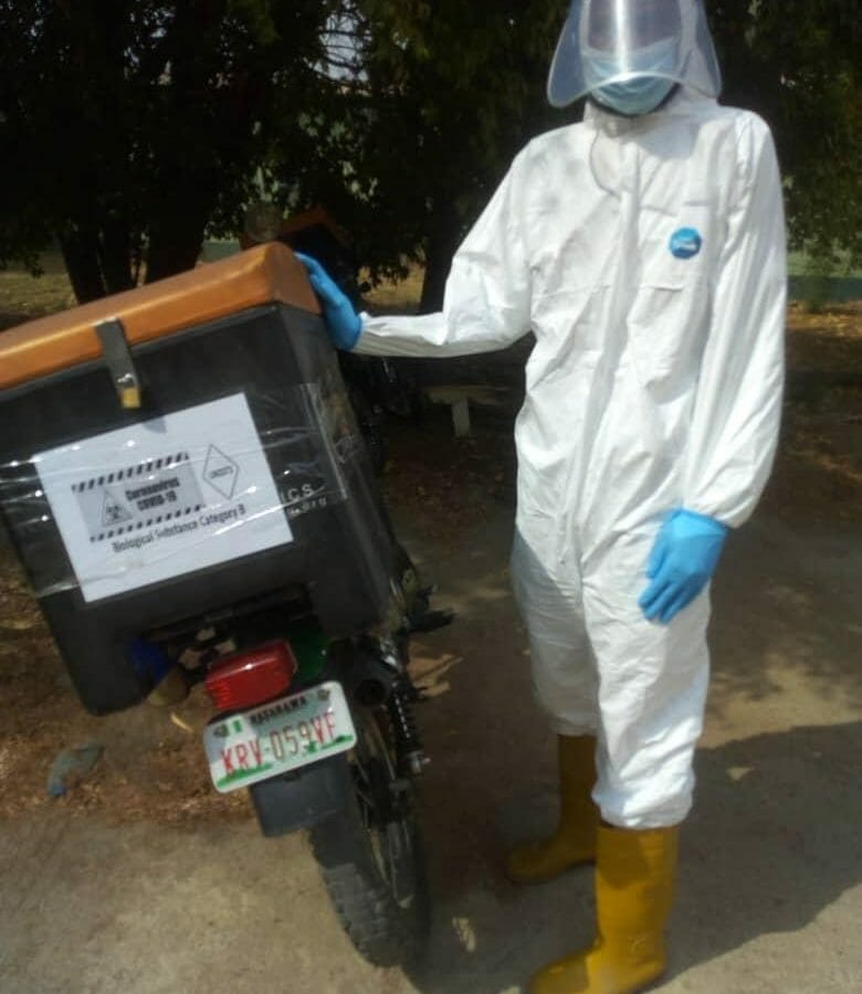 Sample courier in PPE, Nigeria